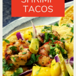 Heart healthy recipe includes one corn tortilla filled with sautéed shrimp and topped with pineapple tidbits, avocado pieces, chopped red onions, and cilantro along with baja sauce