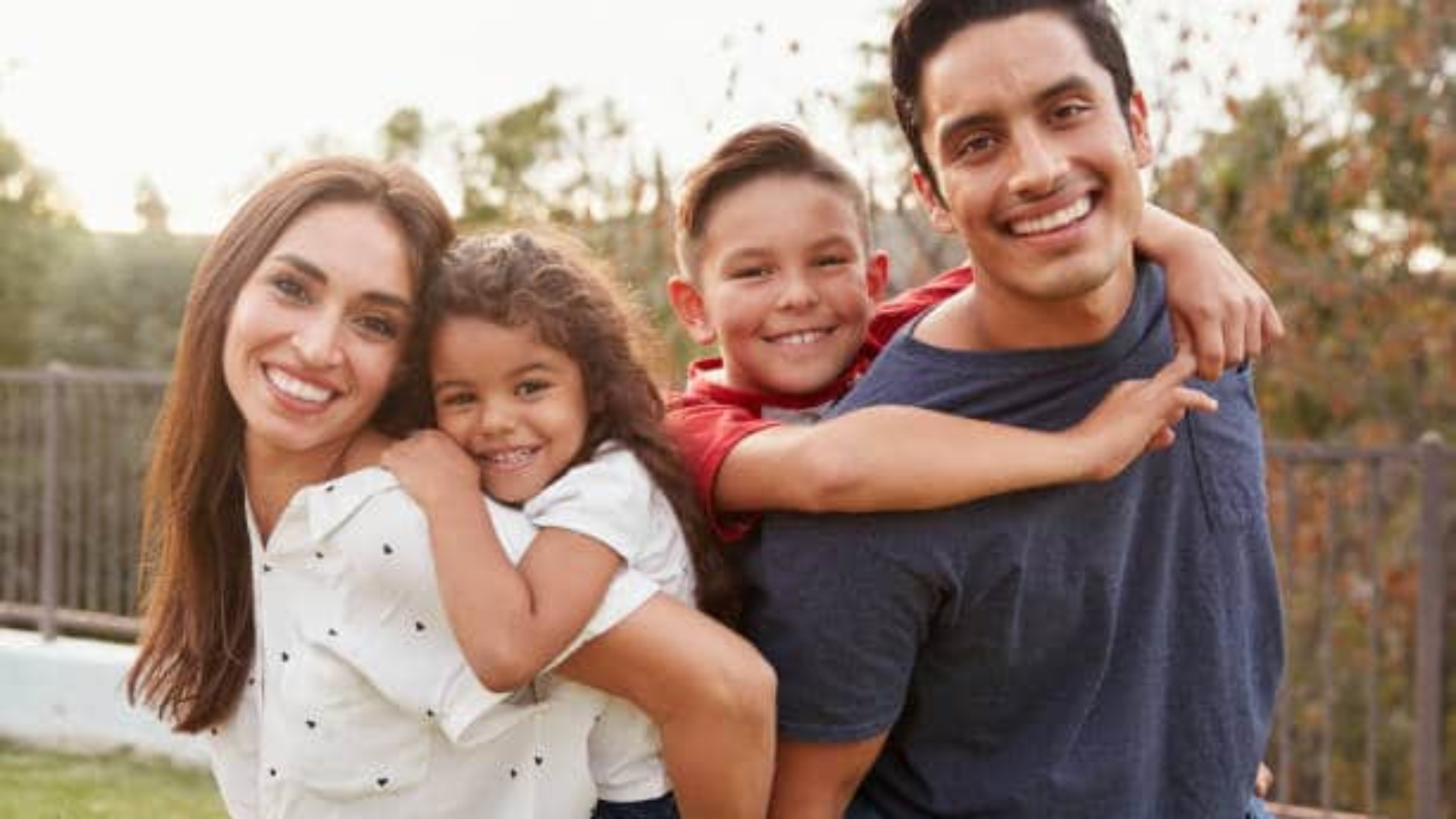 Latino family photo of four